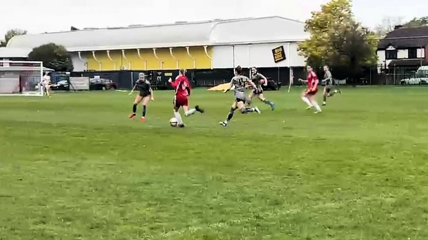 Grace Alexander (grey) battling away at Welling Utd