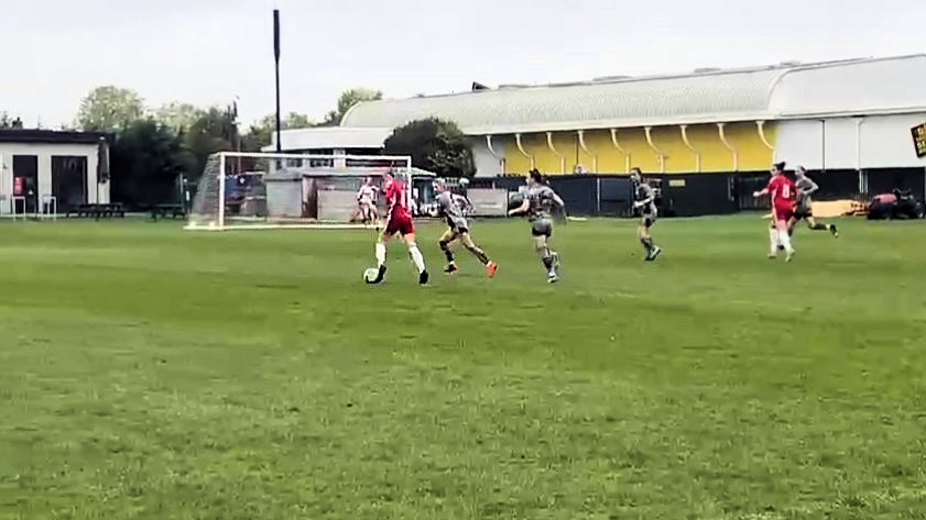 Grace Alexander (grey) battling away at Welling Utd