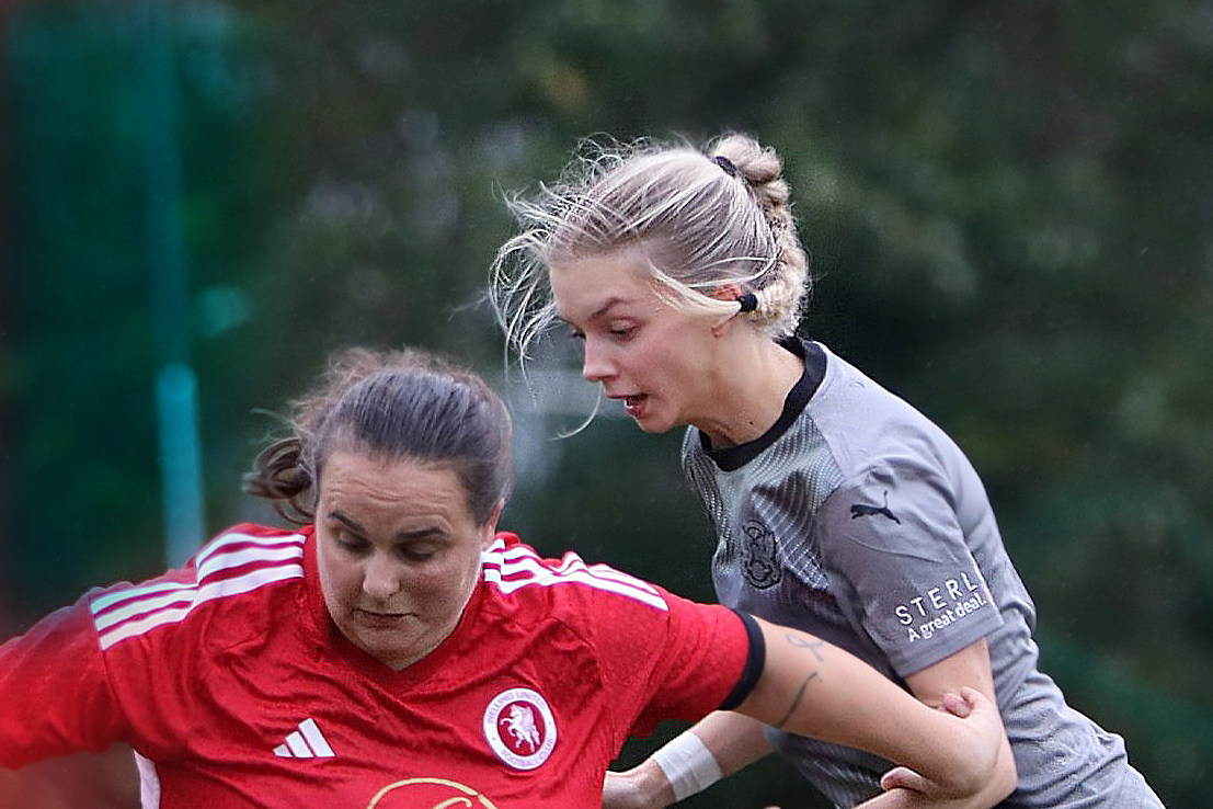 Grace Alexander (grey) battling away at Welling Utd