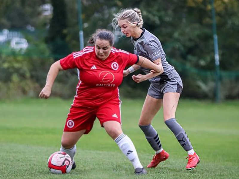 Grace Alexander (grey) battling away at Welling Utd