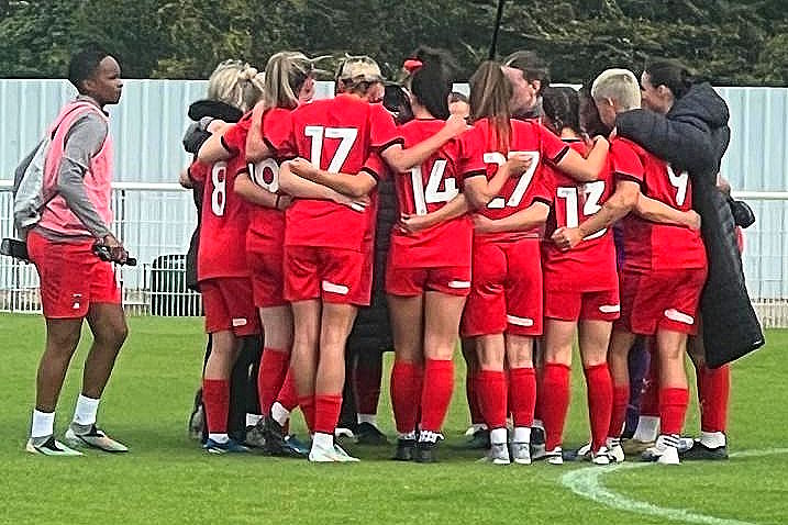 Orient's women in a pre-match huddle before the Needham Market game