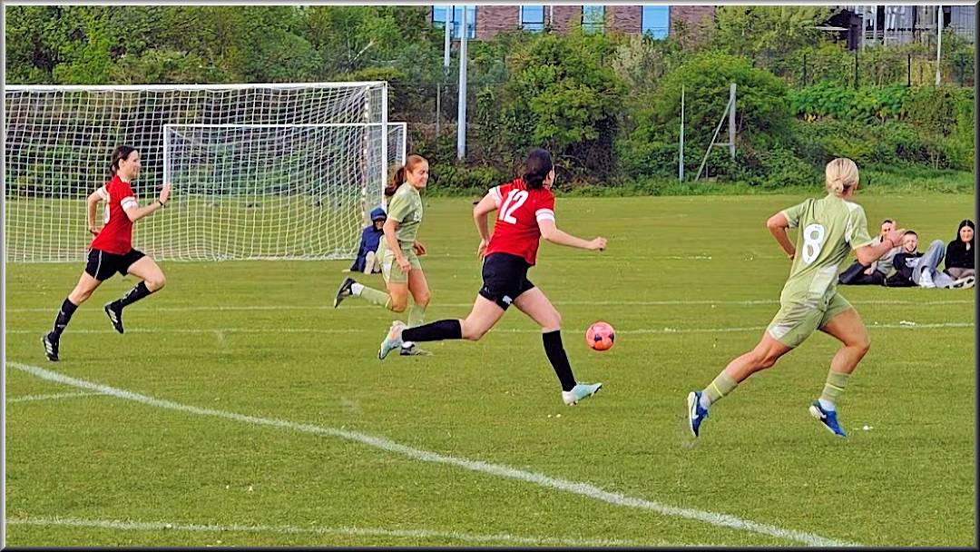 Georgia Griffin and Poppy Binding (No 8) on the attack