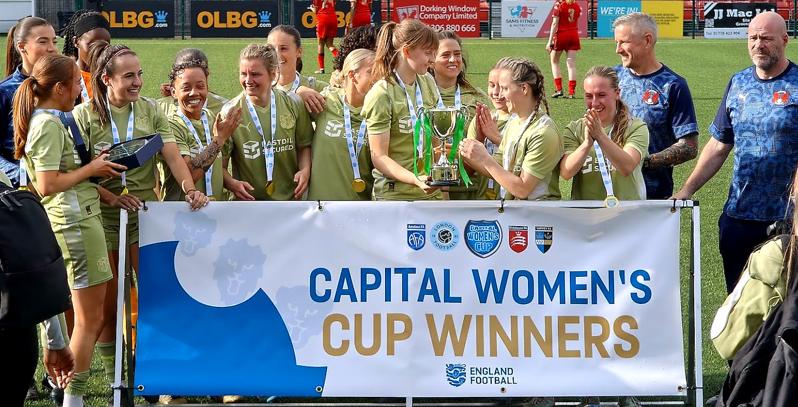Orient women celebrate a cup final win