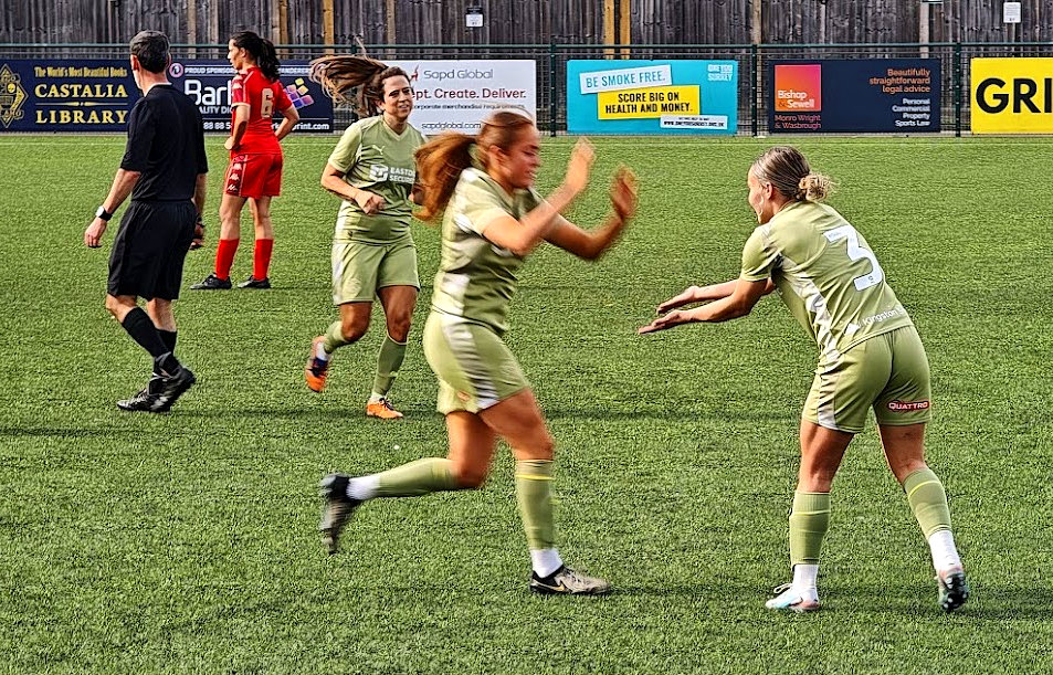 Georgia and Macie celebrate the 'game over' goal.
