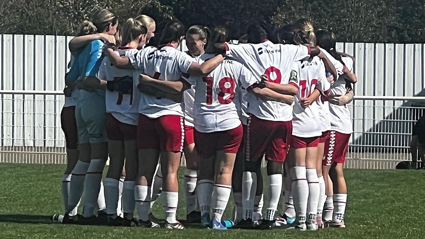 Orient girls huddle