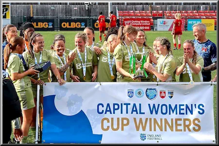 The girls celebrating a cup final win